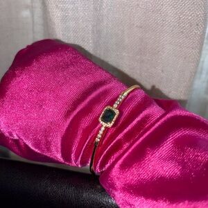 Elegant Gold and Emerald Bracelet